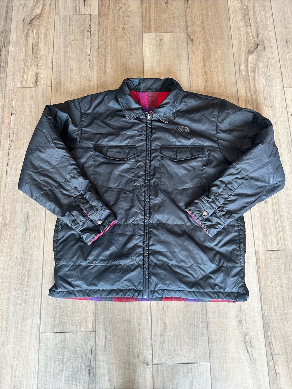 The North Face Men's Black Puffer Jacket/ Reversible Flannel design